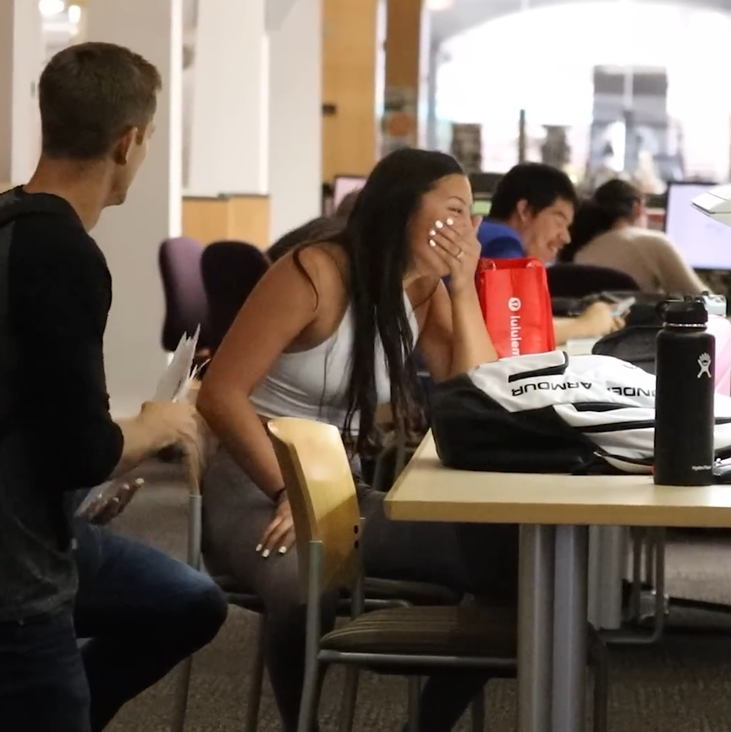 He dropped his papers next to her - then her face got red