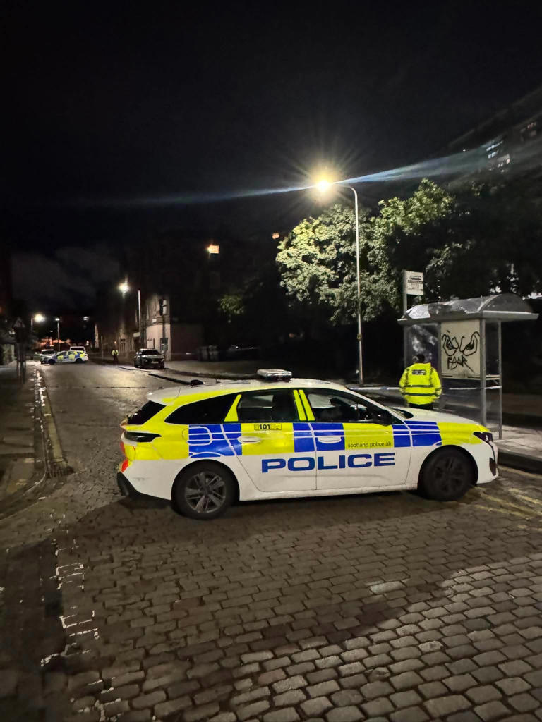 One dead and man arrested after armed police called to Leith flats