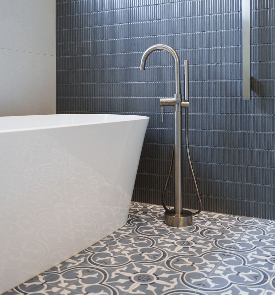 Modern bathroom with patterned tile floors