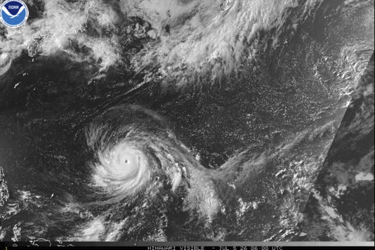 This satellite image from the National Oceanic and Atmospheric Administration shows Typhoon Bavi nearing the U.S. Pacific island territory of Guam on Sunday, July 5, 2026. ©NOAA via AP