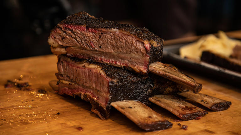 What are dino ribs and how do they compare to pork ribs?