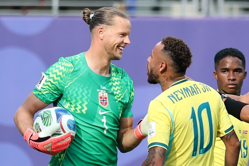 Neymar Jr #10 of Brazil has words with Orjan Nyland #1 of Norway