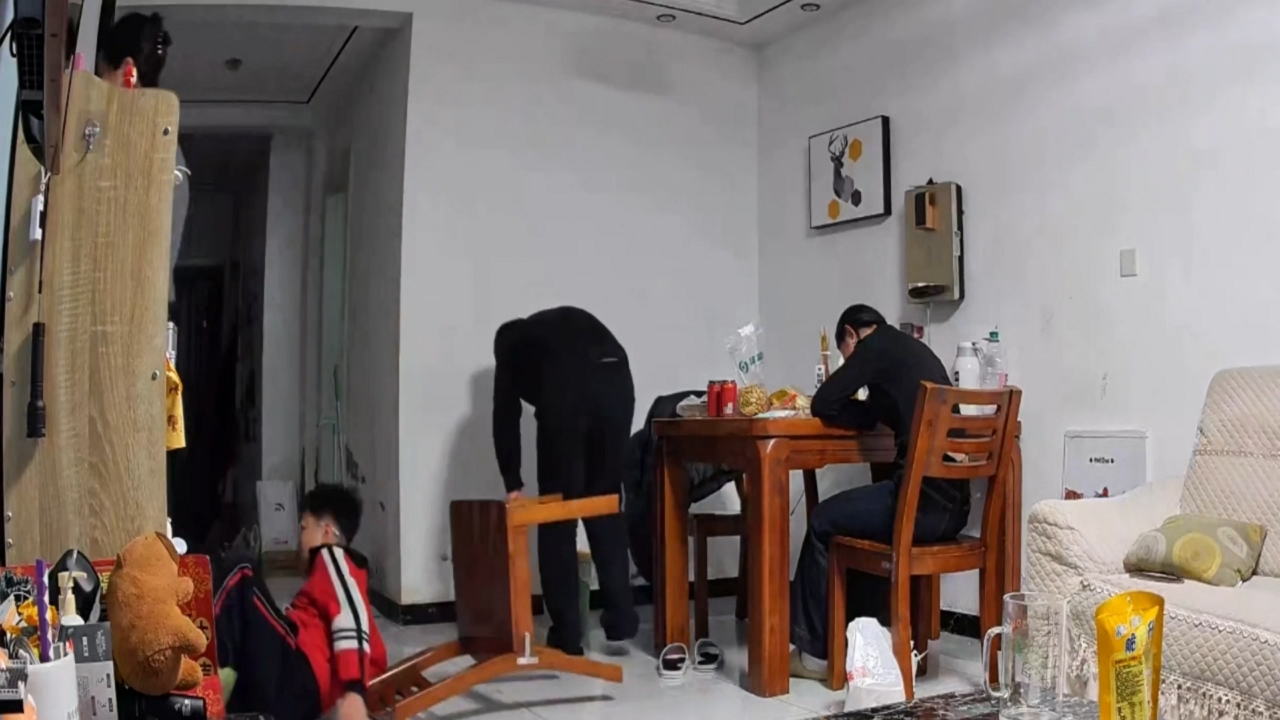 Boy takes a tumble sitting on chair backrest!
