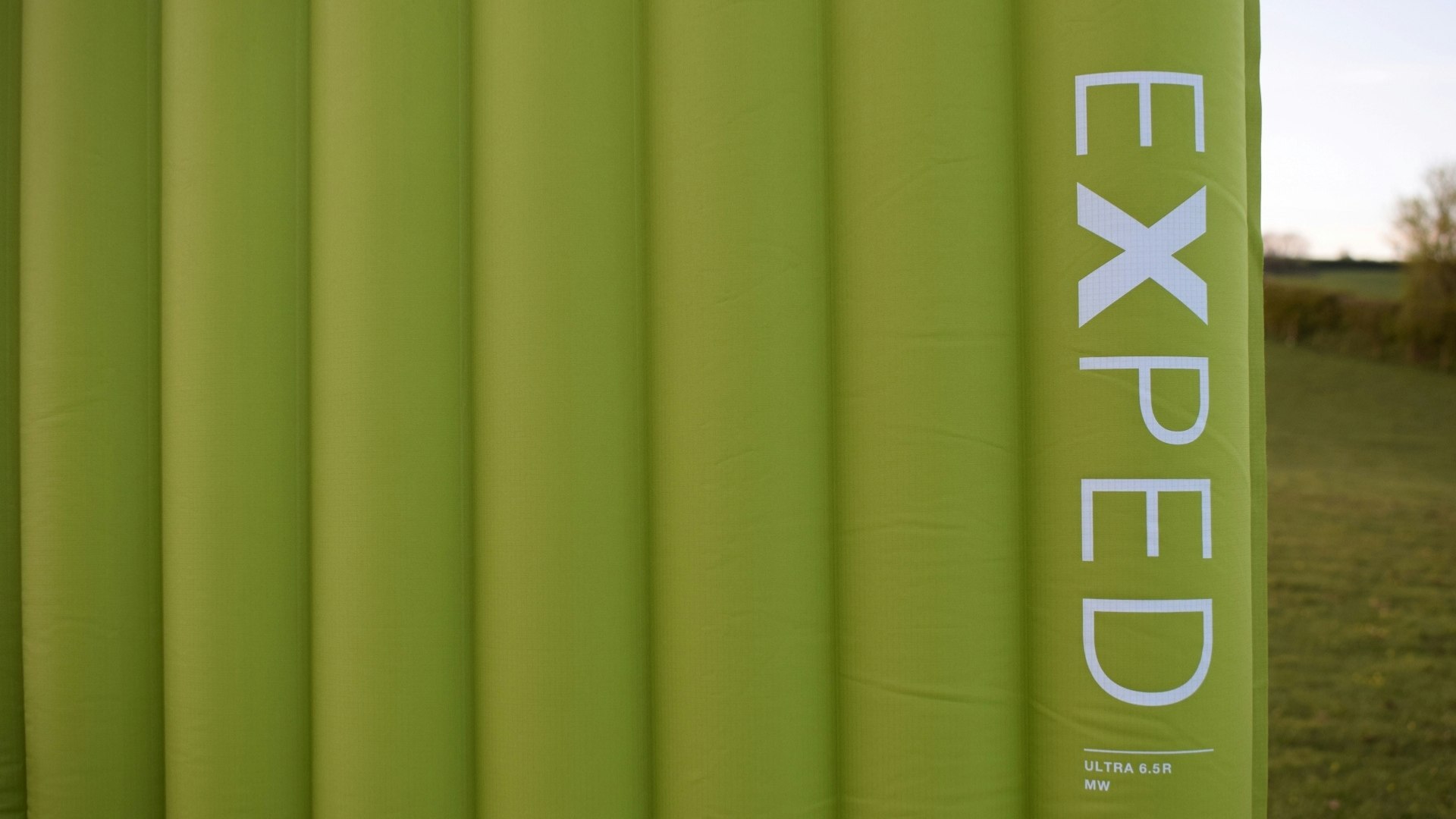 Close up of the Exped Ultra 6.5R sleeping mat with branding on the side