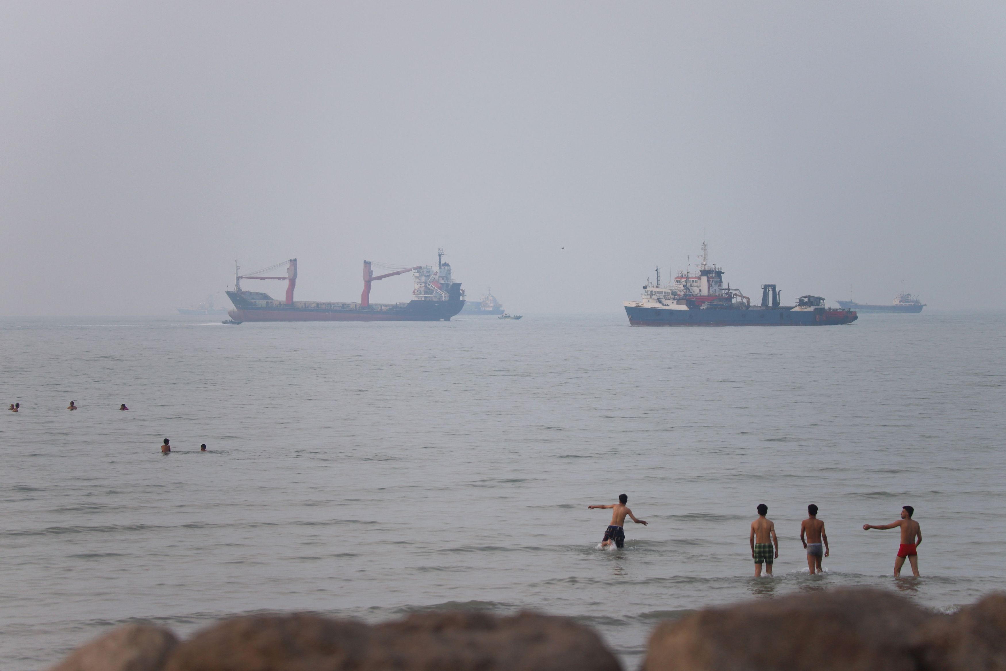 Tanker set on fire after being struck in Strait of Hormuz, British military says