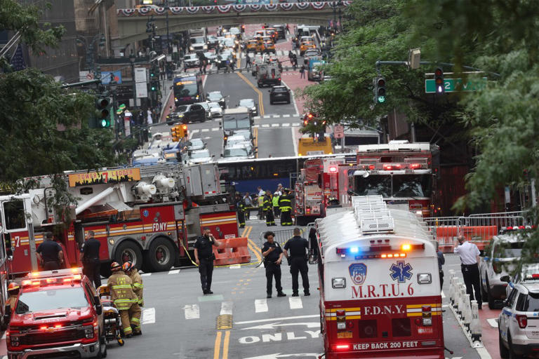 Midtown building evacuated after support beams buckle, floors cave