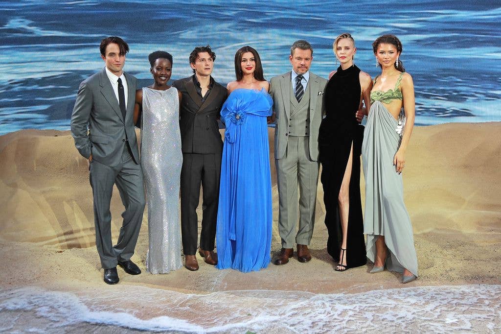 photo of robert Pattinson, Lupita Nyong'o, Tom Holland, Anne Hathaway, Matt Damon, Charlize Theron and Zendaya attend the World Premiere of