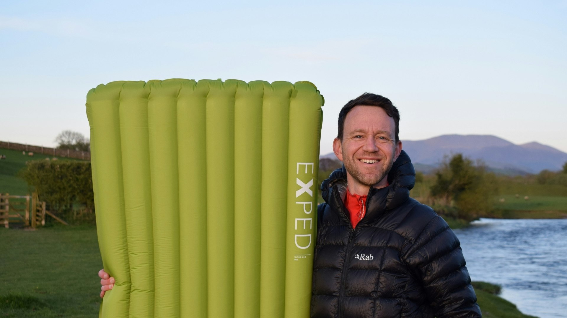 James standing next to the Exped Ultra 6.5R sleeping mat