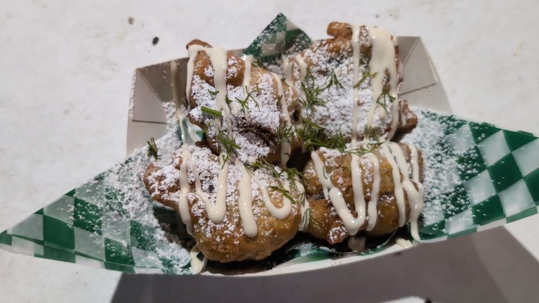Fried pickle Oreos on checkered paper