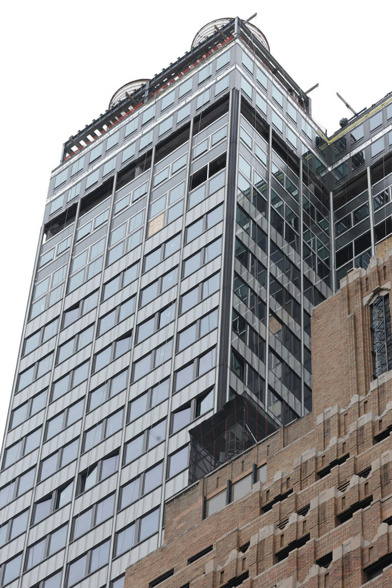 Midtown building evacuated after support beams buckle, floors cave