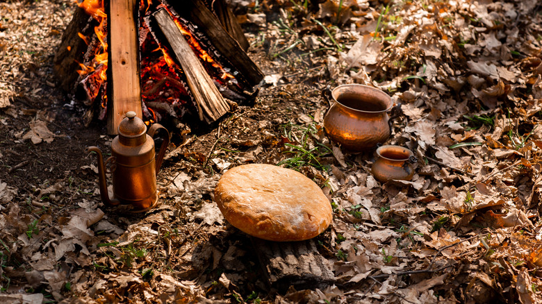 Unleavened bread next to a campfire