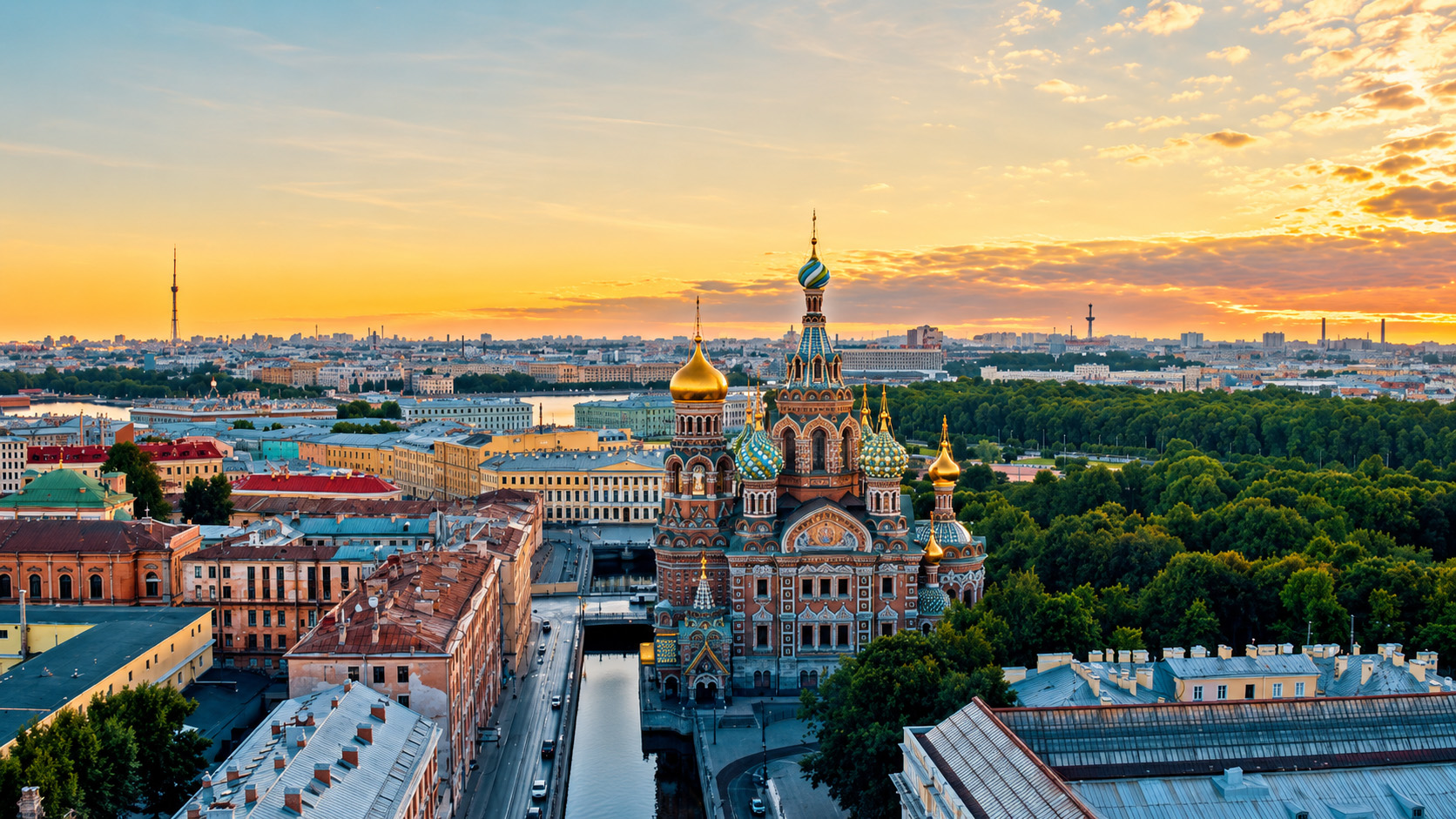 Saint Petersburg’s historic church glowing above the sunset skyline