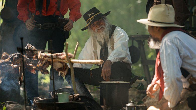 Cowboys preparing their food