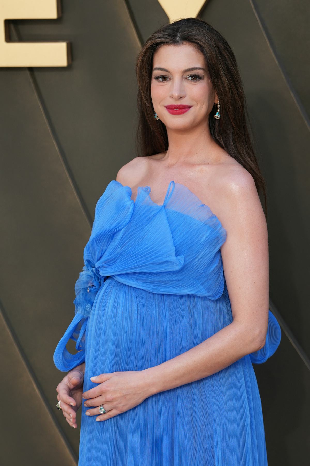Anne Hathaway's maternity outfits for 'The Odyssey' are ruling the red carpet
