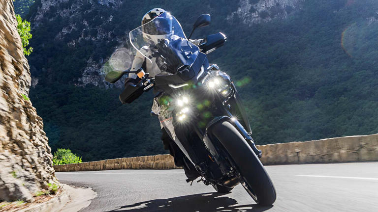 Forget the expensive touring bikes; this used road warrior is calling ...