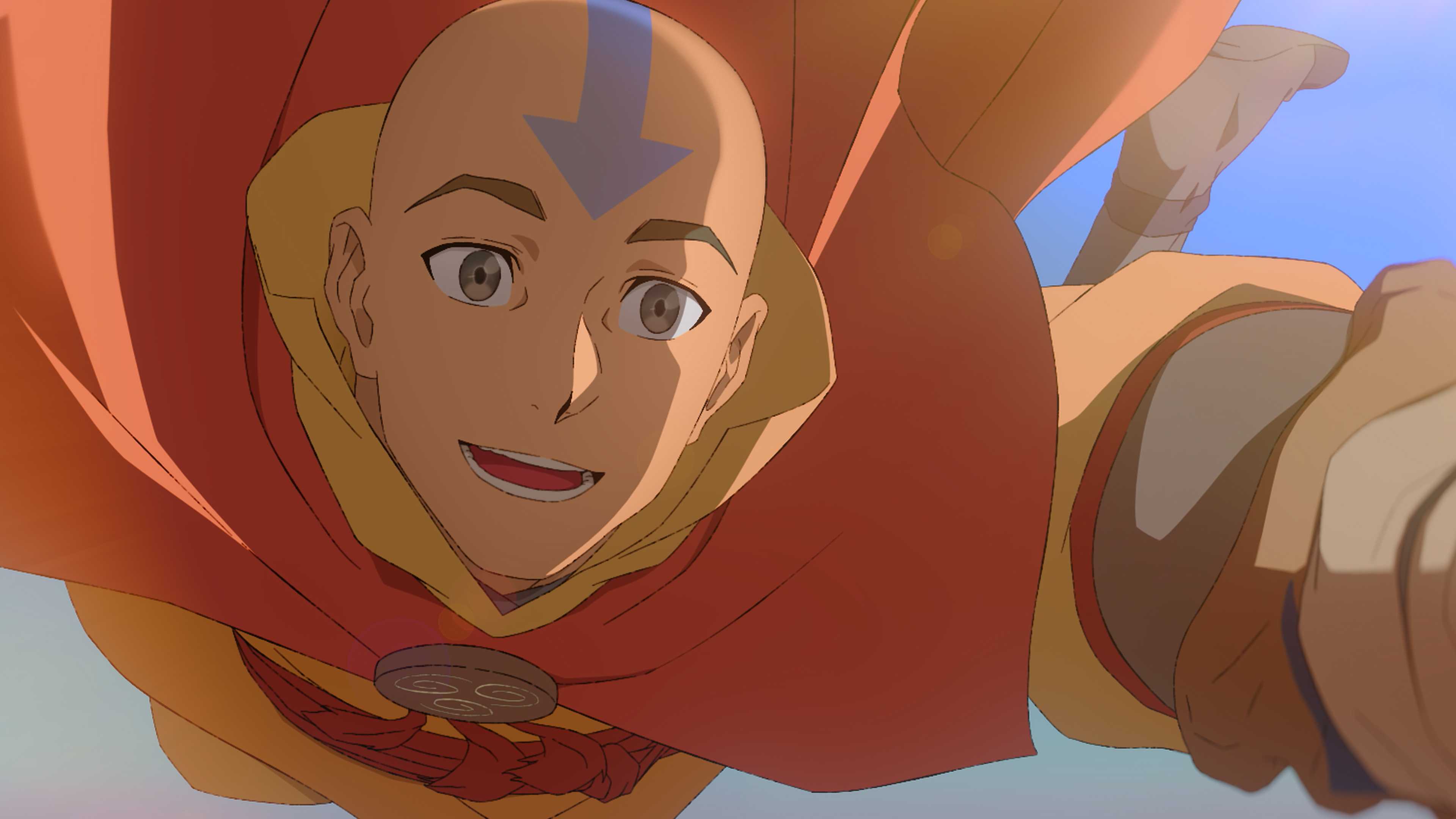 Aang smiling while flying through the sky in Avatar Aang: The Last Airbender