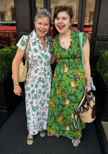 me wearing the dress, posing with my mom