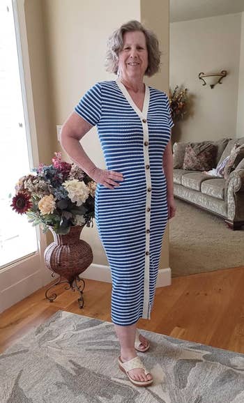 reviewer in short sleeve v-neck blue and white striped fitted midi dress