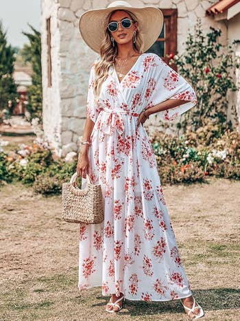 model in white with red floral versio