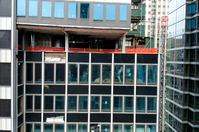 New York shrinks 'frozen zone' around compromised high-rise