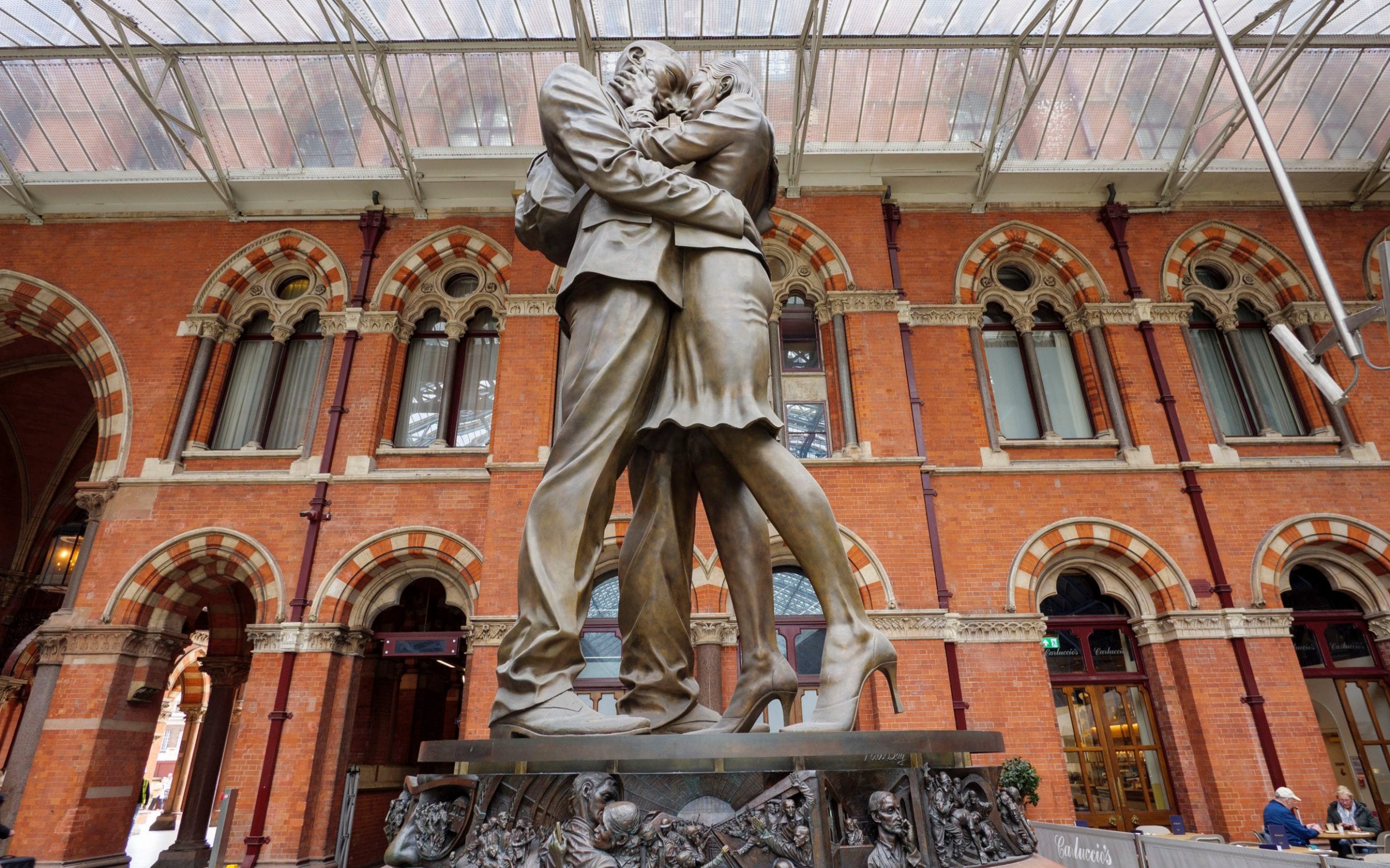 The Meeting Place bronze sculpture by Paul Day at St Pancras International railway station