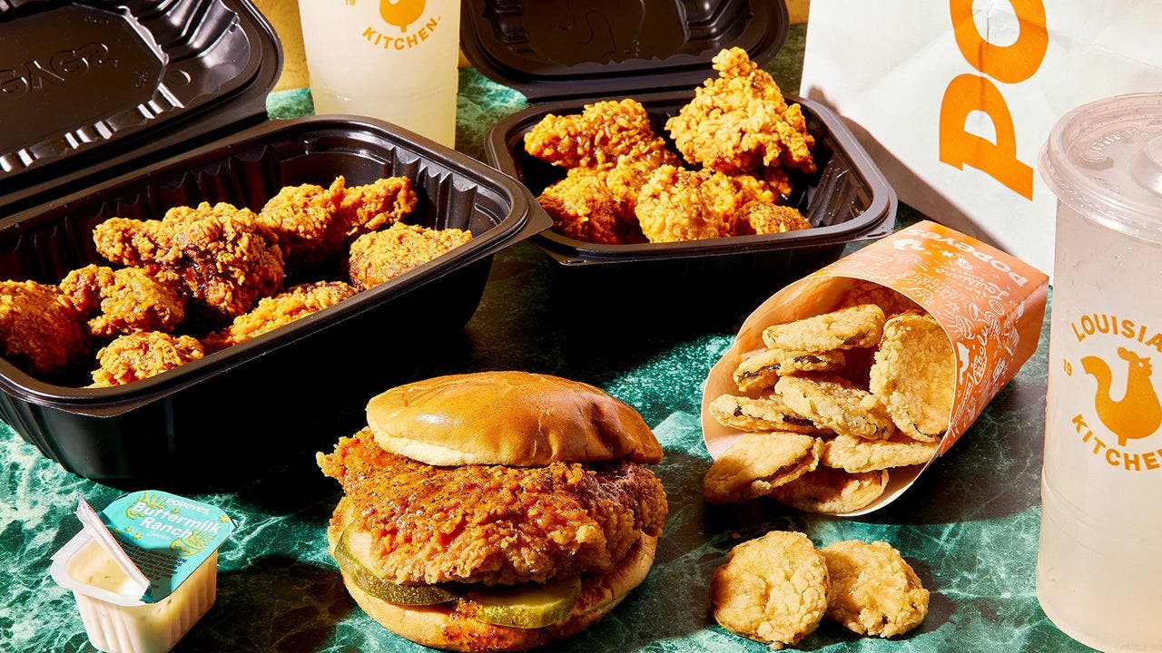 An array of Popeyes fried chicken on a tray.