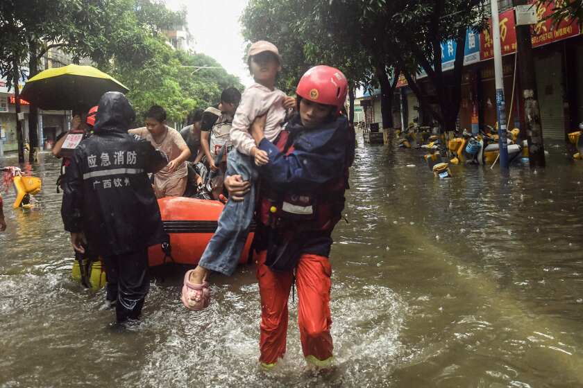 China allocates millions in new disaster relief after storms and a deadly landslide