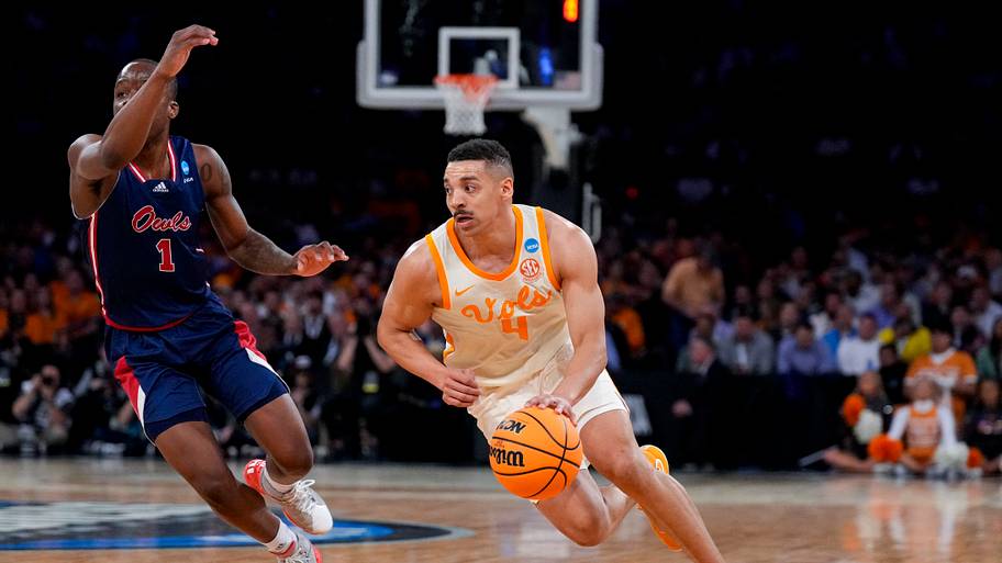 Tennessee Volunteers guard Tyreke Key drives to the basket against Florida Atlantic Owls guard Johnell Davis