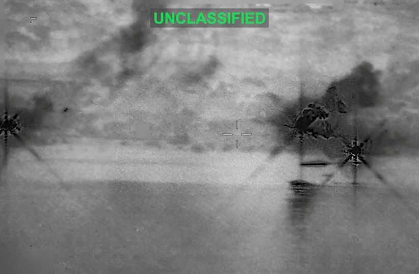 Smoke rises at an unknown location following what US Central Command says is a new wave of strikes against Iran on Tuesday after three tankers were hit by projectiles in the Strait of Hormuz, in this still image taken from video released July 7, 2026. (credit: U.S. Central Command/Handout via REUTERS/File Photo)