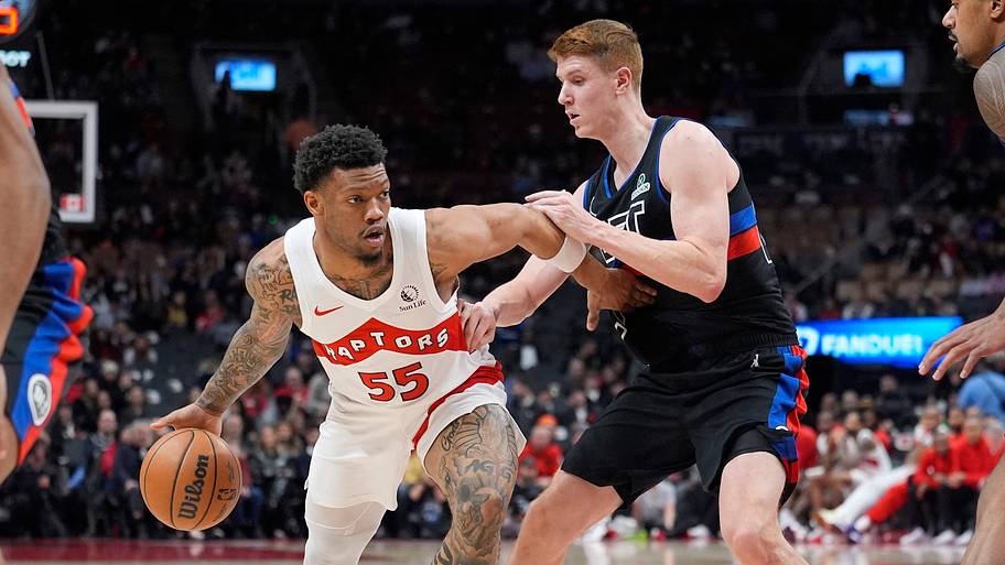 Toronto Raptors guard Alijah Martin controls the ball against Detroit Pistons guard Kevin Huerter