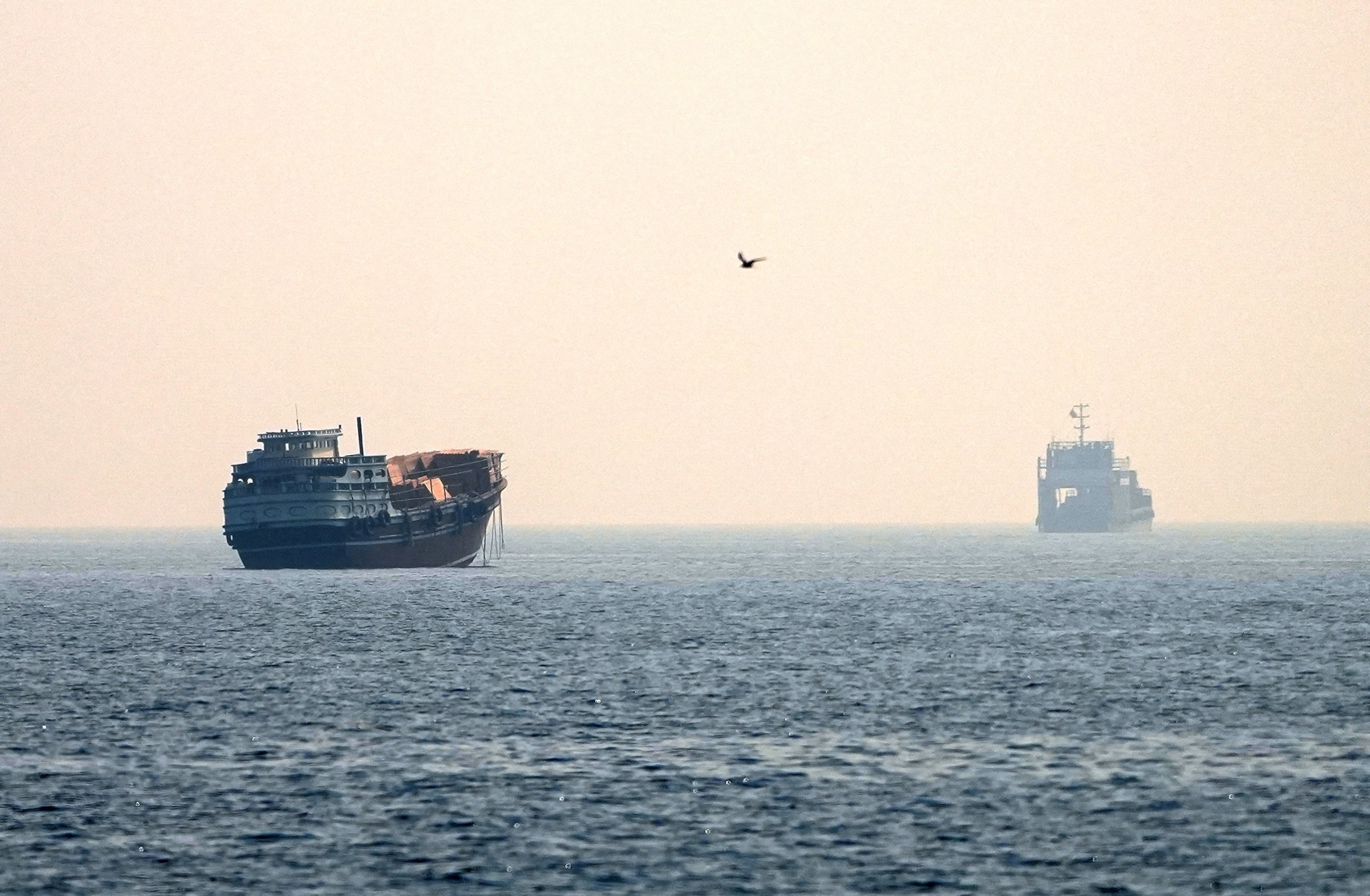 Oil prices climb and stocks fall after exchange of strikes in Middle East