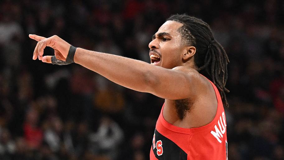 Toronto Raptors forward Collin Murray-Boyles speaks to a teammate in the first half against the Sacramento Kings