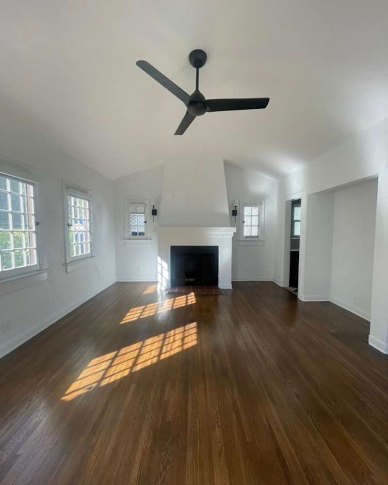Empty white living room before makeover