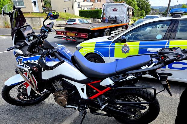Stolen motorcycle recovered after tracker led police to woodland