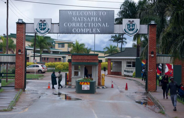 FILE PHOTO: Workers and visitors walk near the entrance to Matsapha Correctional Complex, a maximum-security prison known for holding high-profile detainees, near Manzini, Eswatini's second-largest city, April 23, 2026. REUTERS/Oupa Nkosi/File Photo