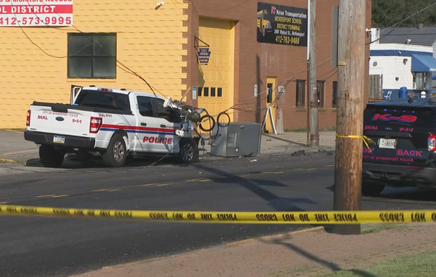 McKeesport police officer injured after crashing into van, utility pole