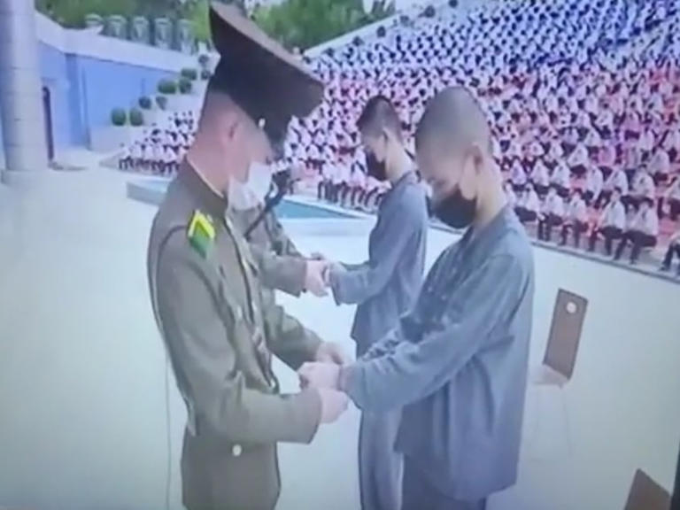 The scene of North Korean authorities handcuffing 16-year-old boys in Pyongyang sentenced to 12 years of labor re-education for watching South Korean dramas several years ago. /Courtesy of 2024 Sand Research Institute's English Newsletter