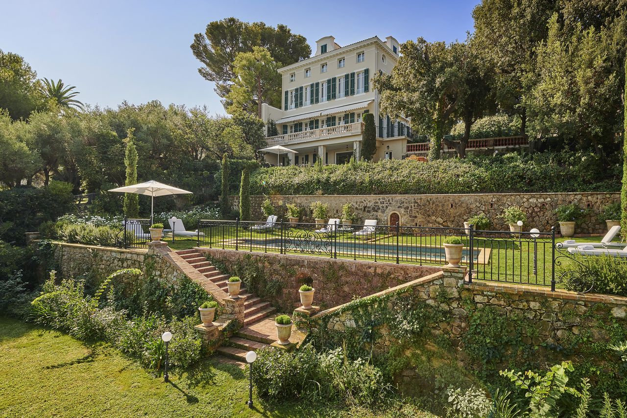 Villa SainteAnne surrounded by gardens terrace and view of a lush landscape