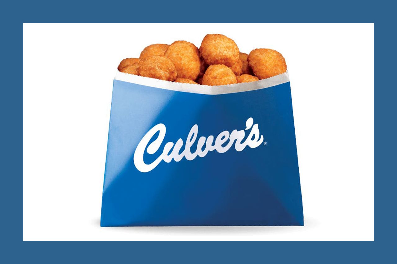 A blue container with the Culvers logo holding fried cheese curds typical fastfood item