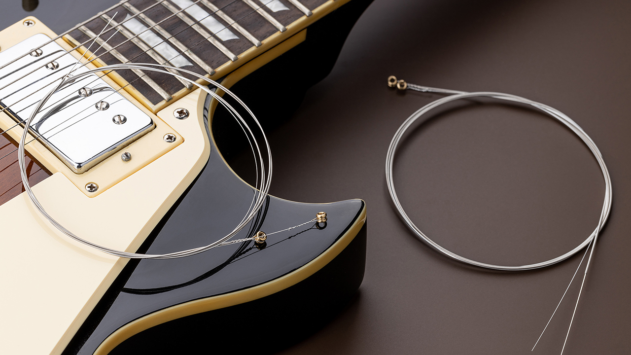 Guitar strings on a Les Paul-style guitar