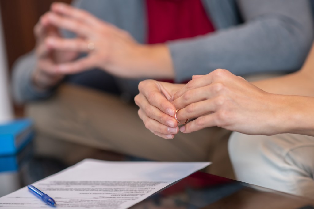 Couple being about to sign a petition for divorce