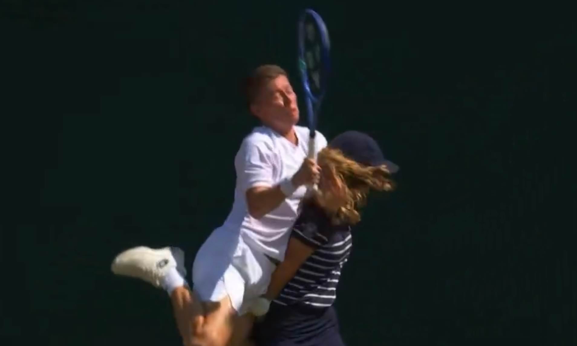 Wimbledon star clatters ball girl, sending them both crashing into the concrete on court