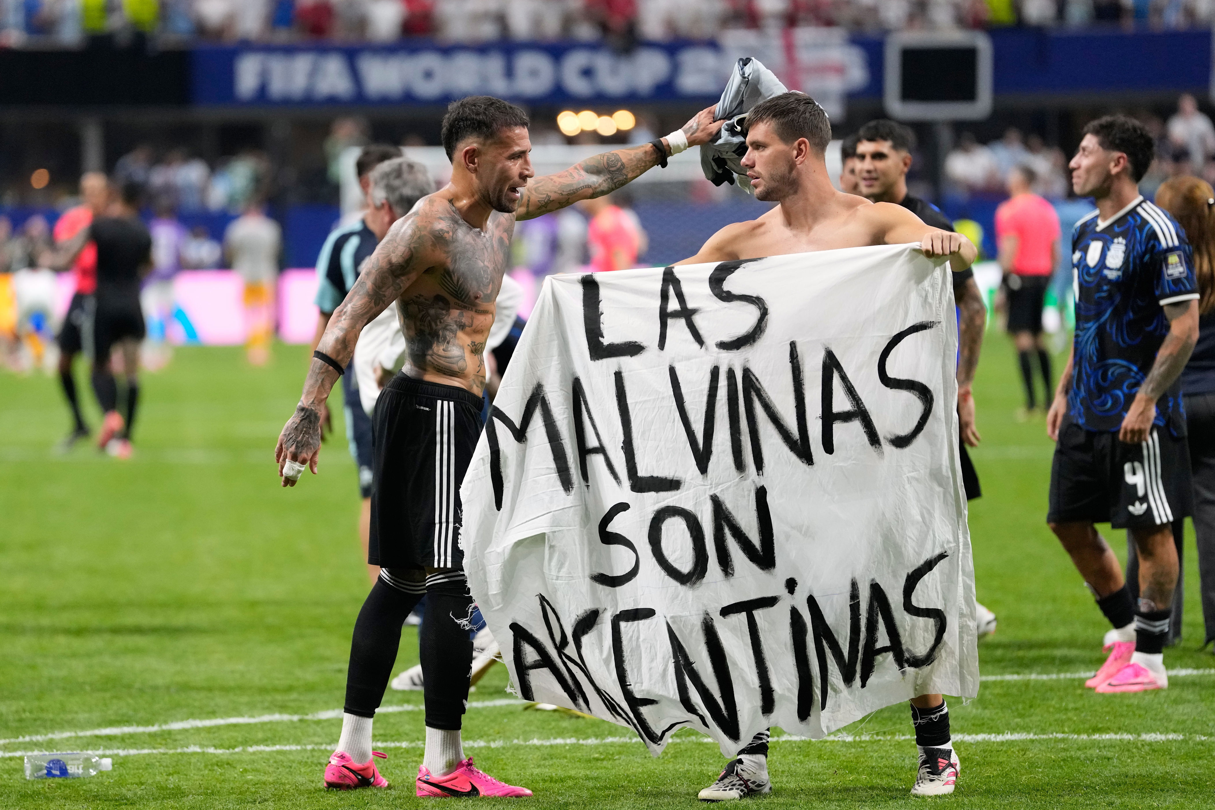 Argentina players brandish political Falklands flag after England match