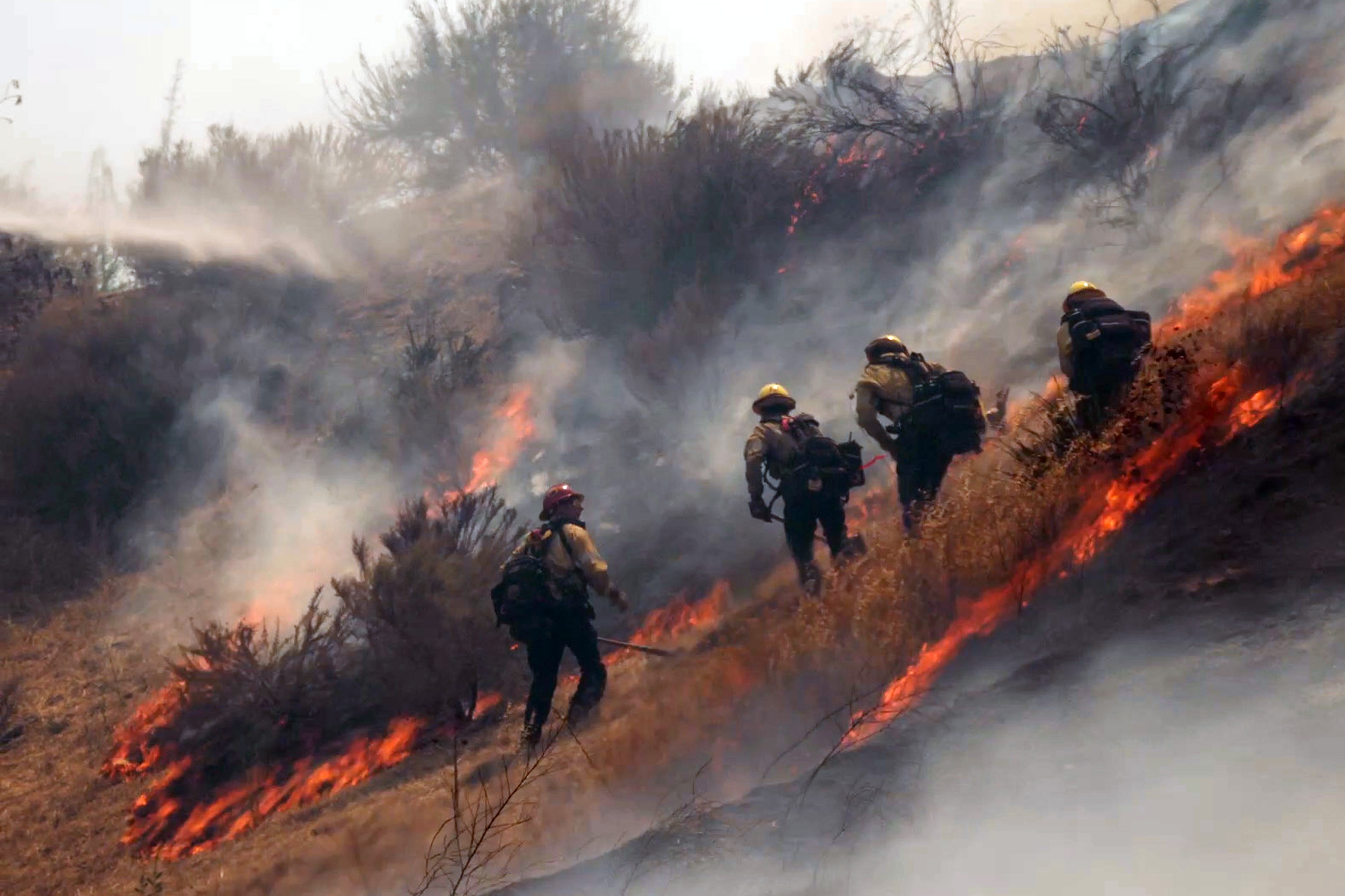 Massive brush fire breaks out dangerously close to SoCal homes, forcing ...