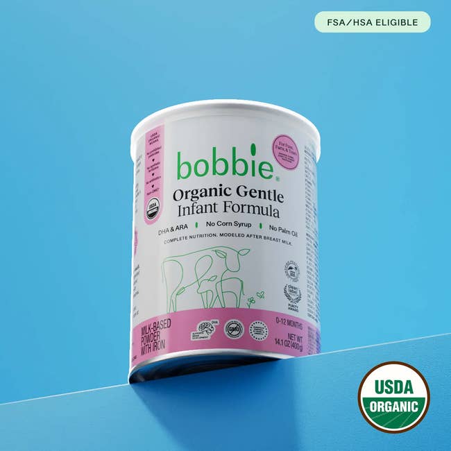 Bobbie Organic Gentle Infant Formula can on blue background, labeled FSA/HSA eligible and USDA Organic