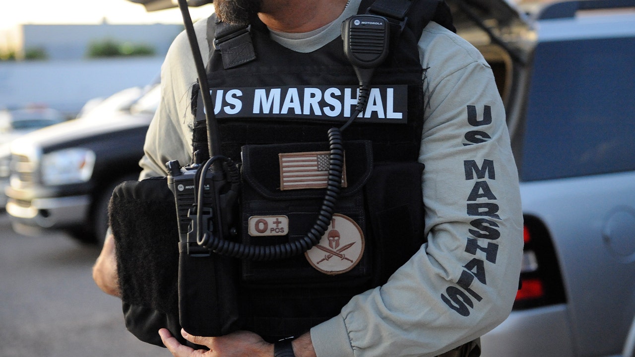 A U.S. Marshal on duty in Denver, Colorado, Saturday, July 30, 2011.