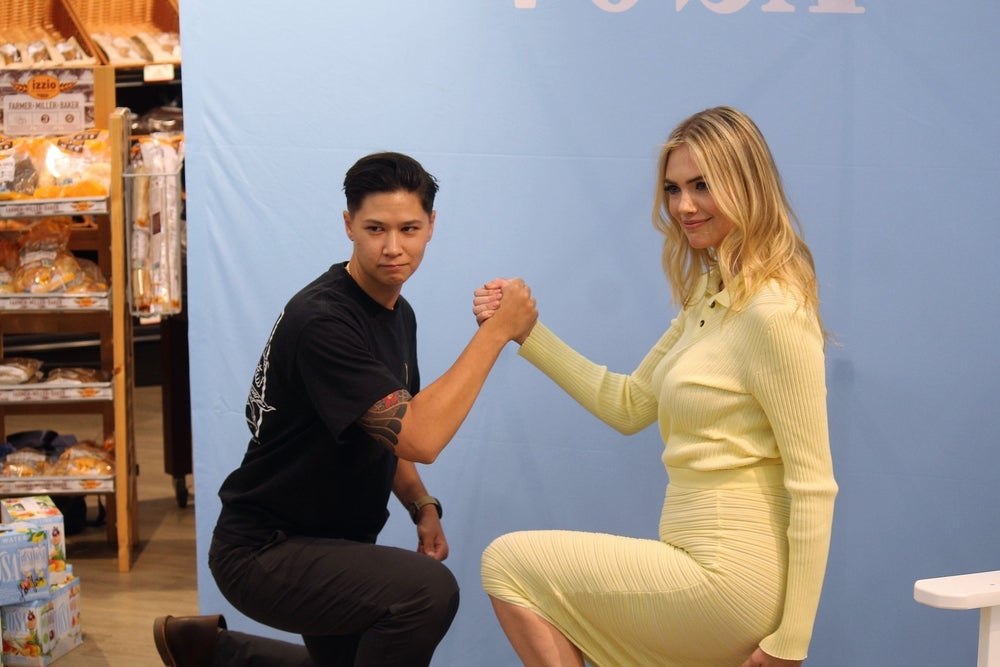 Kate Upton strikes a pose with a fan at the Holland Township Family Fare on Wednesday, Aug. 28.