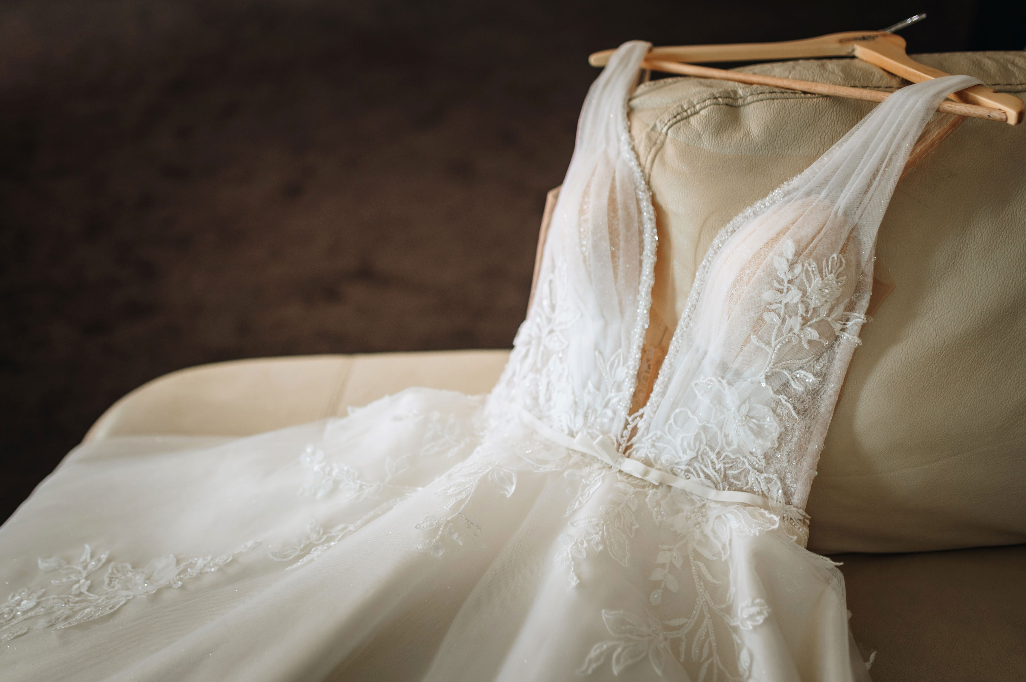 A wedding dress on a hanger