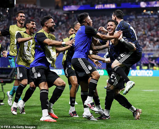 Enzo Fernandez (right) got Argentina level before Lautaro Martinez headed in the winning goal