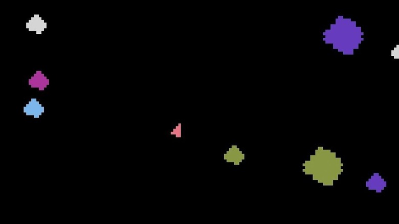 An orange spaceship is surrounded by colorful asteroids in Asteroids